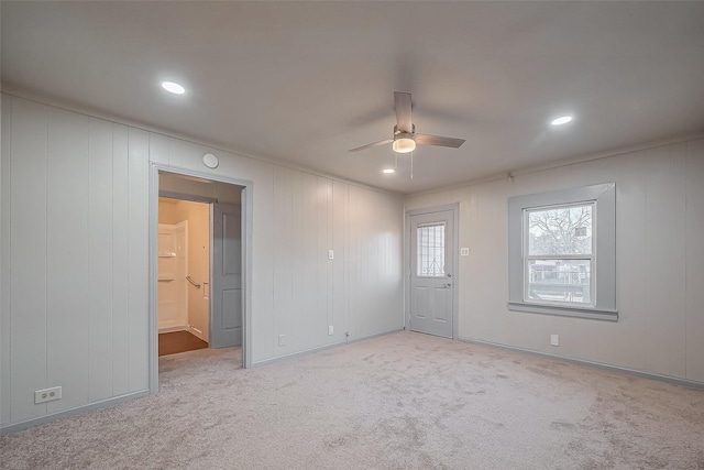 carpeted spare room with ceiling fan and recessed lighting