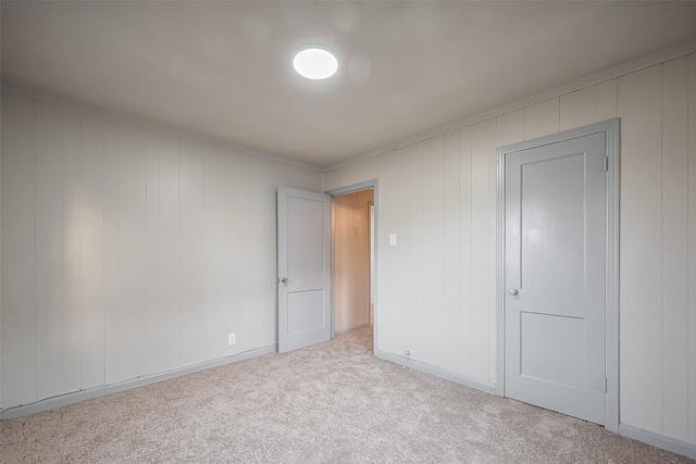 unfurnished bedroom featuring carpet floors