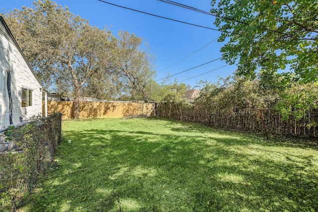 view of yard featuring a fenced backyard