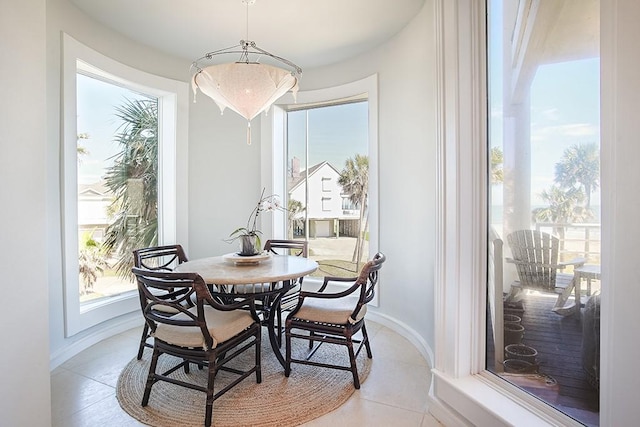 4214 Turks Pt, Galveston, TX 77554 - dining room with a wealth of natural light and baseboards