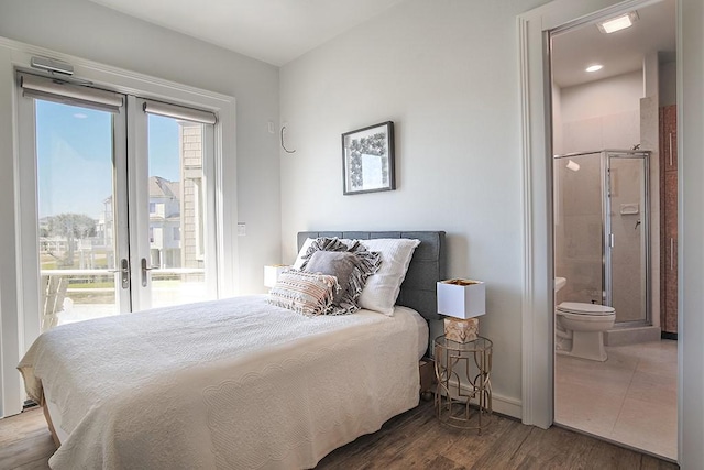 4214 Turks Pt, Galveston, TX 77554 - bedroom featuring connected bathroom, wood finished floors, baseboards, access to exterior, and french doors