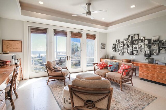4214 Turks Pt, Galveston, TX 77554 - living area with light tile patterned flooring, a raised ceiling, and recessed lighting