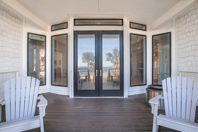 4214 Turks Pt, Galveston, TX 77554 - doorway to property with a deck and french doors