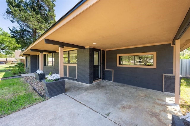 view of patio featuring a carport