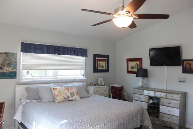 bedroom featuring lofted ceiling and a ceiling fan