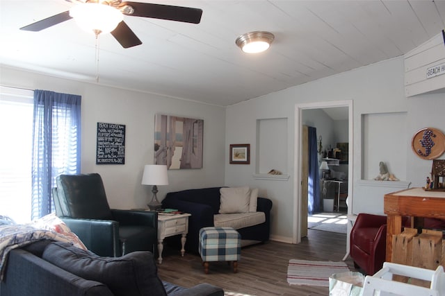 living area featuring ceiling fan, wood ceiling, vaulted ceiling, and wood finished floors