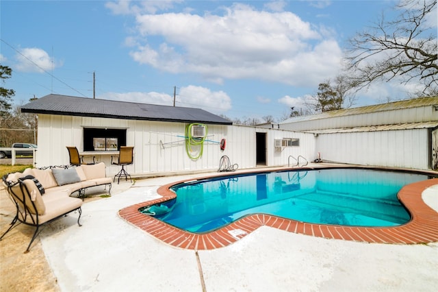 view of pool with an outdoor living space, a fenced in pool, and a patio