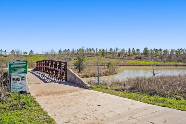 view of property's community featuring a water view