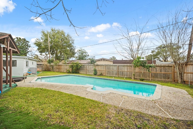 view of pool featuring a fenced backyard, a fenced in pool, and a yard