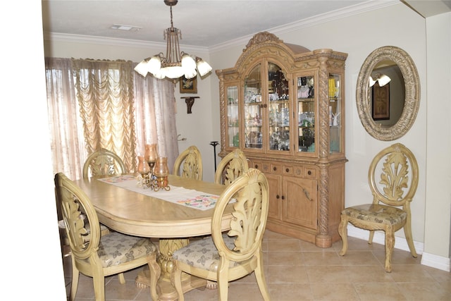 dining area with a chandelier, visible vents, crown molding, and light tile patterned floors