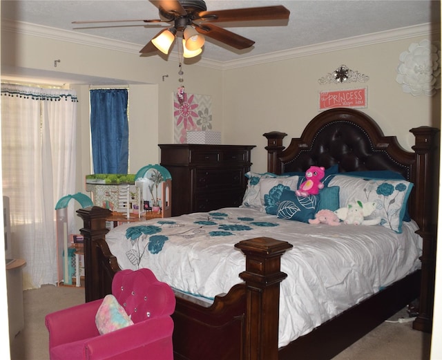 bedroom with carpet floors, crown molding, and ceiling fan