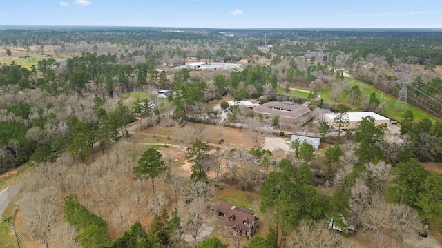 drone / aerial view with a view of trees