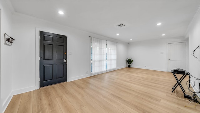 foyer featuring recessed lighting, visible vents, and light wood-style flooring