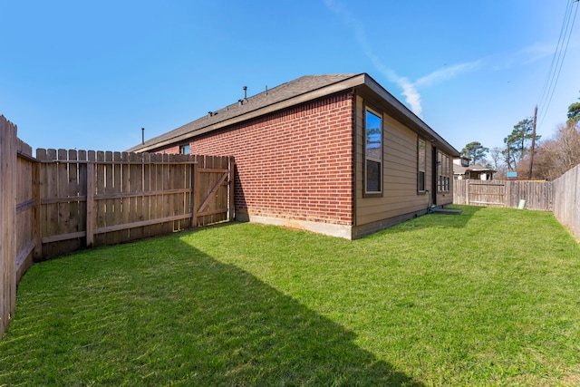 exterior space featuring a fenced backyard