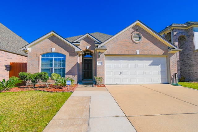 ranch-style house with brick siding, an attached garage, a front yard, fence, and driveway