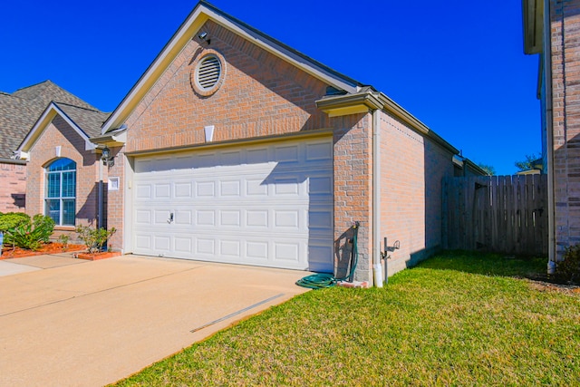 view of front of property featuring an attached garage, driveway, fence, and brick siding