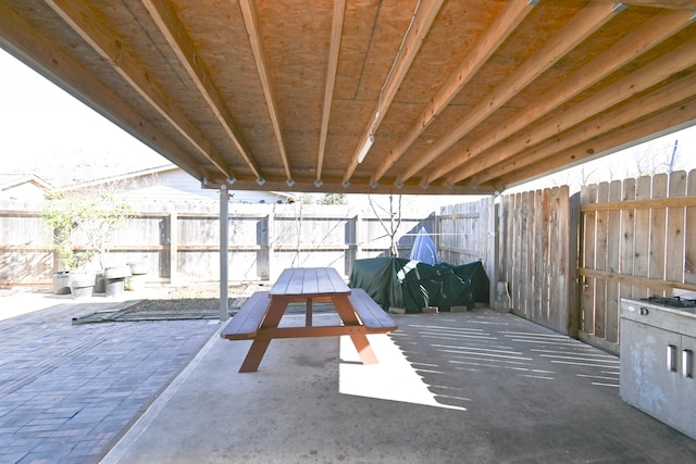 view of patio / terrace featuring a fenced backyard and outdoor dining area