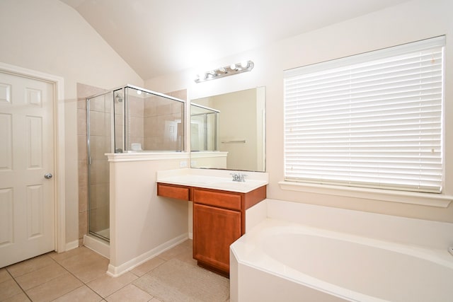 full bath with a stall shower, lofted ceiling, tile patterned flooring, vanity, and a bath