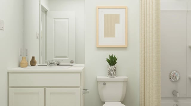 bathroom with toilet, shower / tub combo with curtain, and vanity