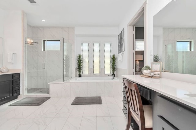 full bath with marble finish floor, a garden tub, visible vents, a shower stall, and vanity