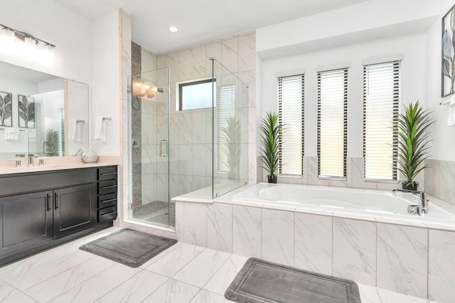 full bathroom featuring a garden tub, recessed lighting, vanity, marble finish floor, and a shower stall