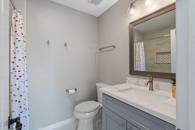 bathroom with visible vents, toilet, curtained shower, baseboards, and vanity