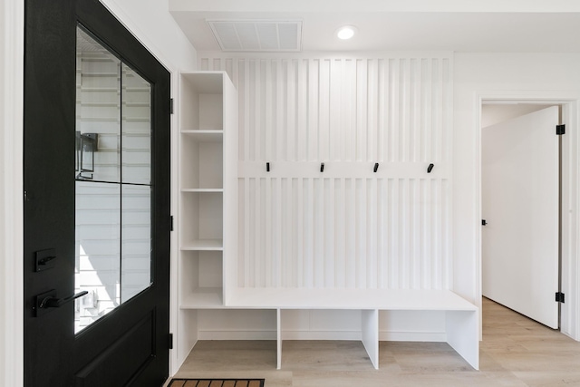 mudroom with visible vents and light wood-style floors