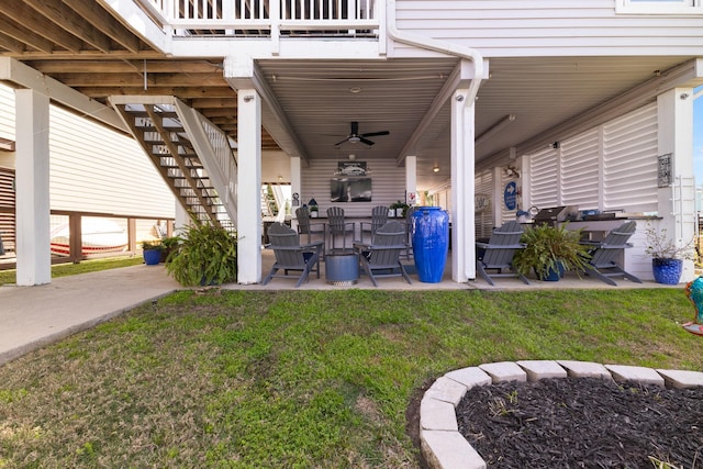 view of patio / terrace with outdoor dining area and stairway