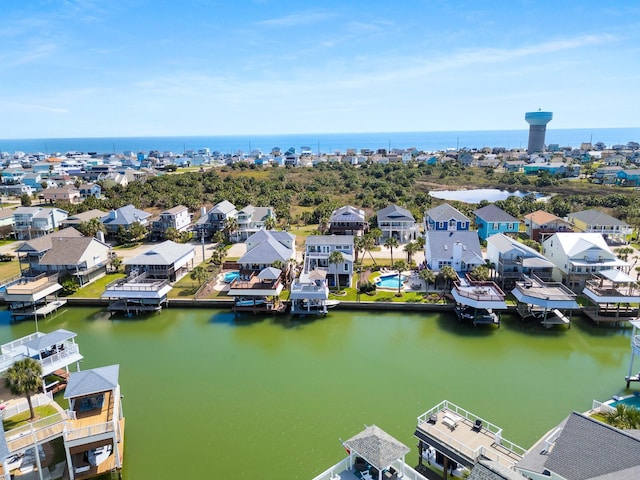 aerial view featuring a water view and a residential view