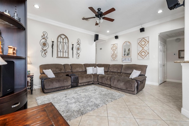 living area with light tile patterned floors, baseboards, ceiling fan, crown molding, and recessed lighting