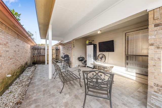 view of patio with fence