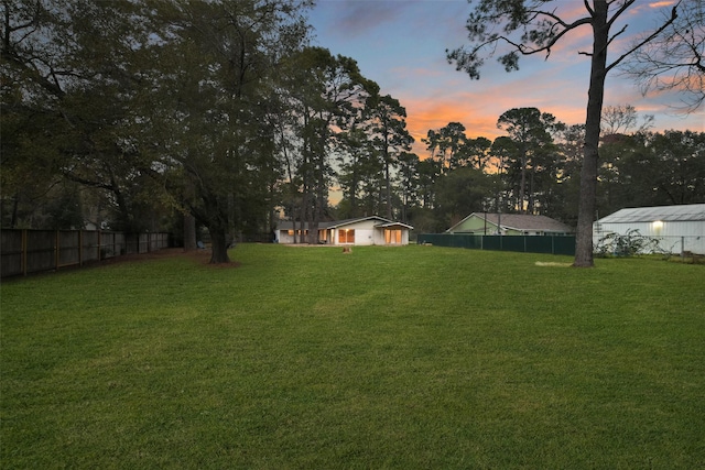 yard at dusk with fence