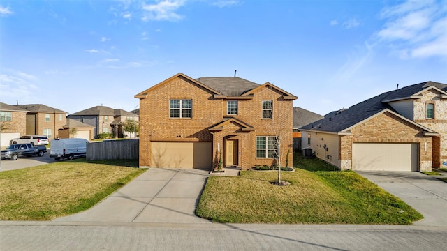 traditional-style home featuring concrete driveway, brick siding, and a front lawn