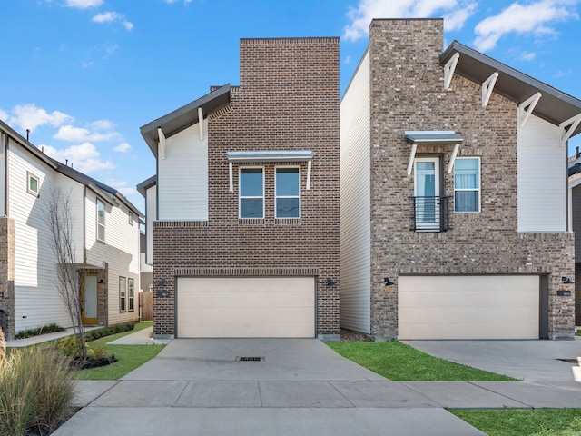 view of front of house with brick siding, driveway, and an attached garage