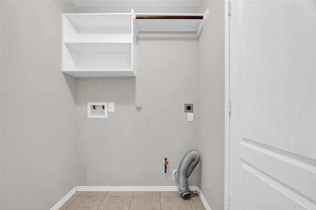 clothes washing area with laundry area, hookup for an electric dryer, washer hookup, and hookup for a gas dryer