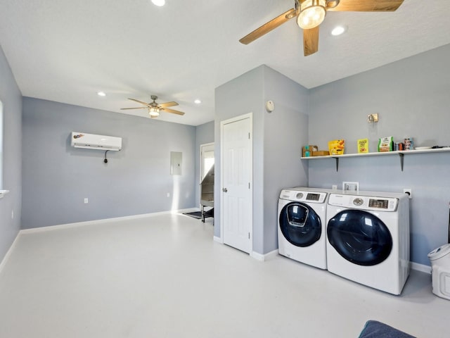 clothes washing area featuring recessed lighting, baseboards, separate washer and dryer, and a wall mounted AC