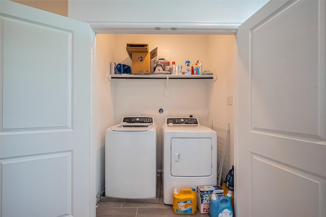 laundry area featuring laundry area and separate washer and dryer