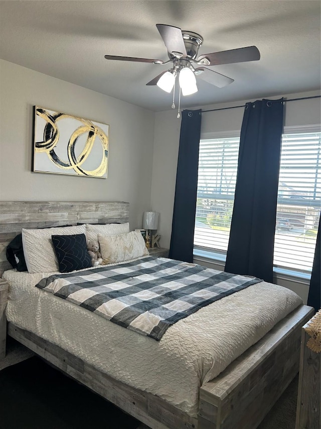 bedroom featuring ceiling fan