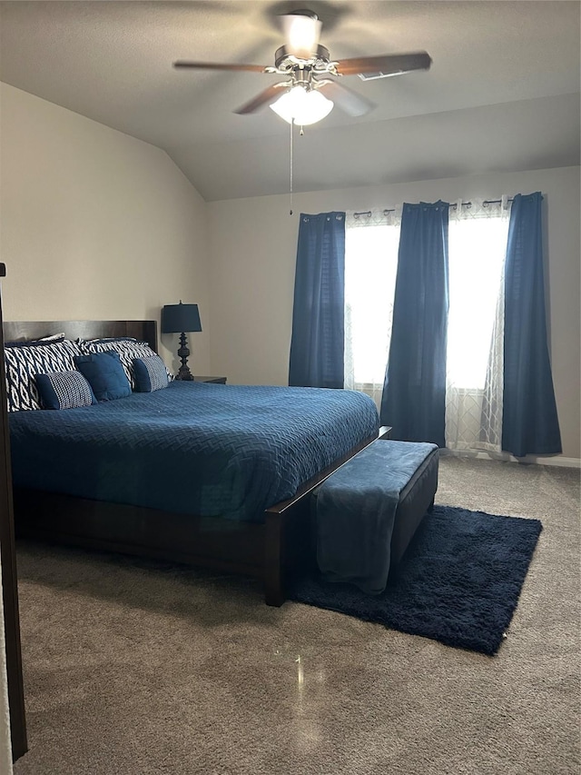 bedroom featuring vaulted ceiling and a ceiling fan