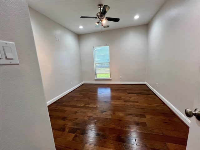 empty room with visible vents, a ceiling fan, recessed lighting, wood-type flooring, and baseboards