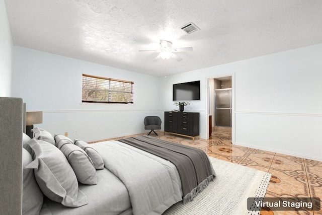 bedroom featuring a ceiling fan, baseboards, visible vents, and a textured ceiling