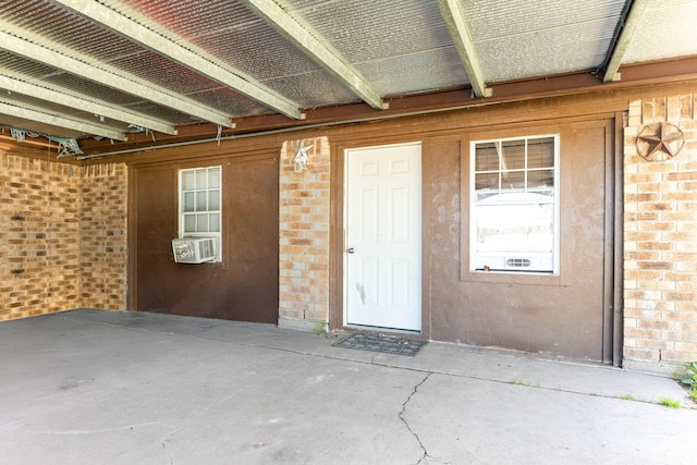 property entrance featuring cooling unit