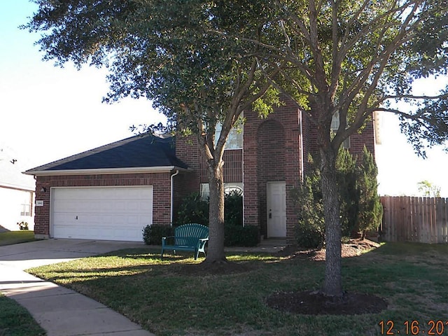 10842 White Oak Point Ct, Cypress, TX 77429 - view of front facade featuring an attached garage, driveway, and brick siding