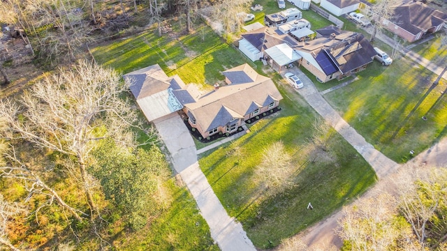 birds eye view of property with a residential view