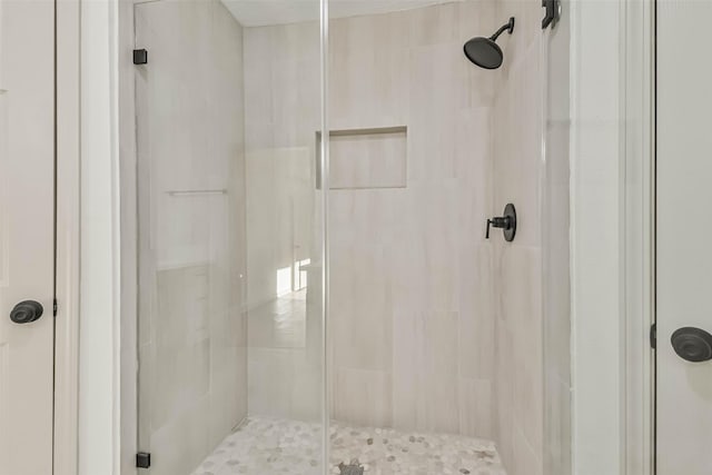 bathroom featuring a stall shower