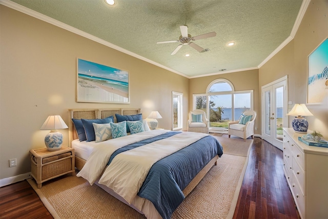 bedroom featuring ornamental molding, access to outside, visible vents, and hardwood / wood-style floors