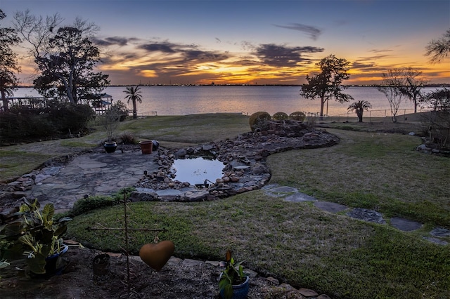 view of yard with a water view