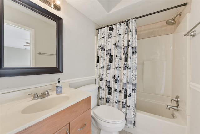 full bathroom featuring vanity, toilet, and shower / tub combo with curtain