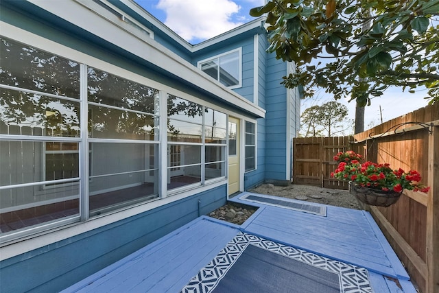 view of patio / terrace featuring a deck and fence