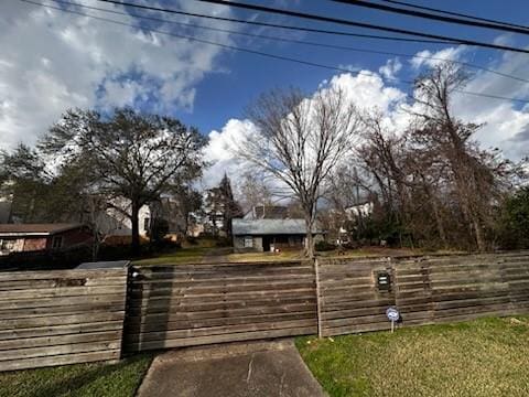 exterior space with a fenced front yard